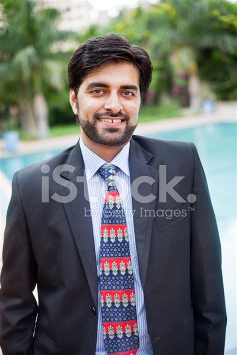 Outdoor Portrait Of Handsome Asian Indian Businessman Stock Photo
