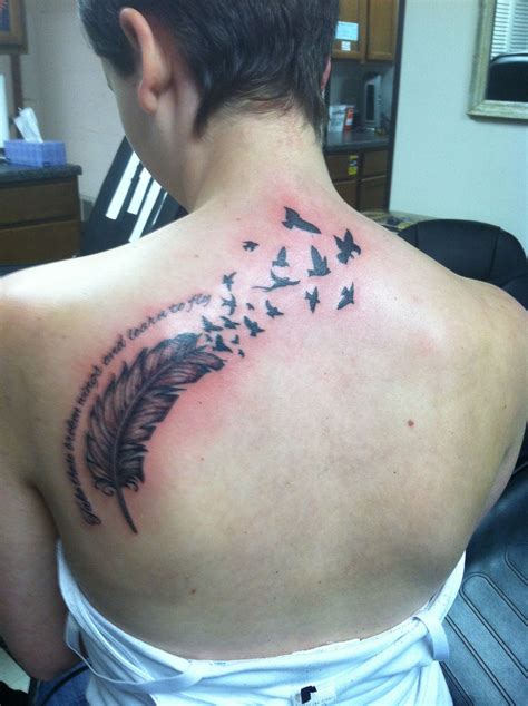 broken bird wings tattoo