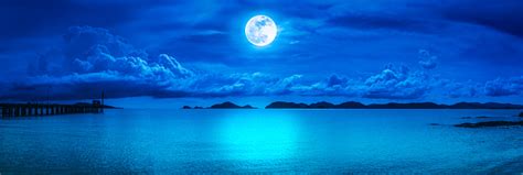 Panorama Of Sky With Full Moon On Seascape To Night Stock Photo
