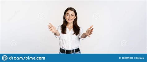 enthusiastic laughing woman smiling and stretching out arms forward welcome you greeting