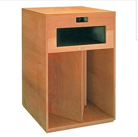 A Wooden Cabinet With A Black Electronic Device In It
