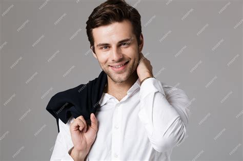 Premium Photo Image Of Attractive Businessman 30s Smiling And Holding
