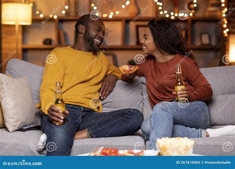Loving Black Couple Enjoying Lazy Evening Together At Home Stock Image