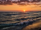 tramonto al mare Foto % Immagini| tramonto, riflessi, mare Foto su ...