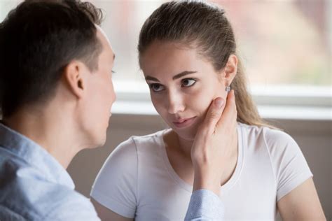 What does it mean when a guy touches your face? | Body Language Central