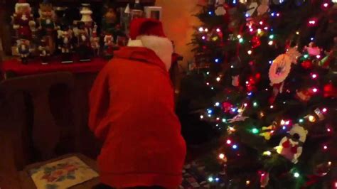 Santa Claus Leaving Presents Under The Tree Youtube