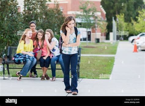 Girl Being Teased By Other Girls Stock Photo Alamy