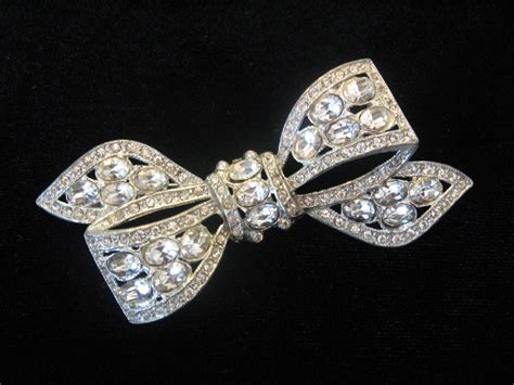 vintage clear rhinestone brooch bow shape by jwvintagejewelry