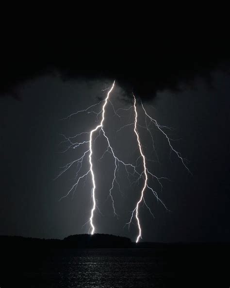 Dual Strike Two Lightning Bolts Arc To The Ground As A Thunderstorm