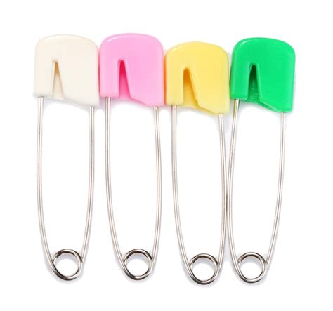 Premium Photo Multicolor Safety Pins Isolated On White