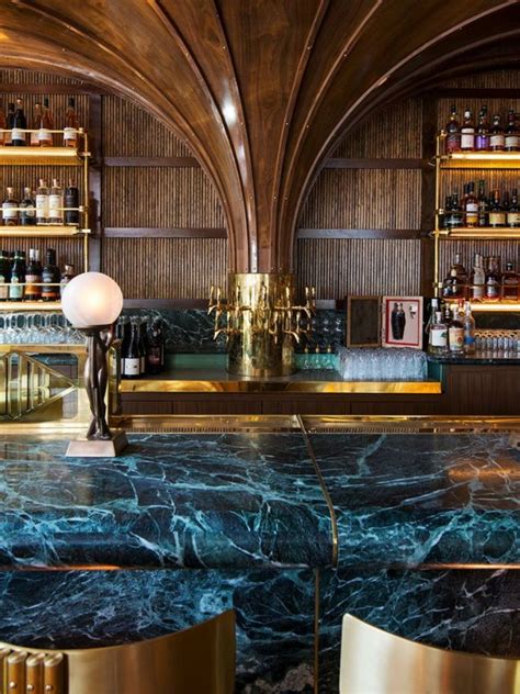 Stunning Art Deco Style Bar With Dark Marble Counter Top Restaurant