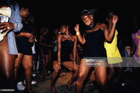 Jamaica Kingston Group Of Women Dancing In Street Night Photo Getty