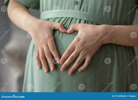 Close Up Of Pregnant Woman Show Heart Gesture Stock Image Image Of Female Expecting 217639545