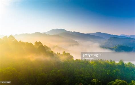 Beautiful Sunshine At Misty Morning Mountains High Res Stock Photo