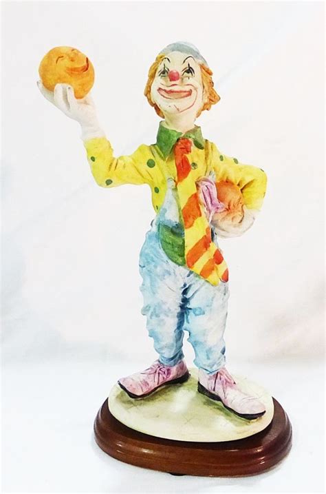 Personalized home decor is the best way to share life's joy. Vintage resin clown hobo on wood stand home decor ...