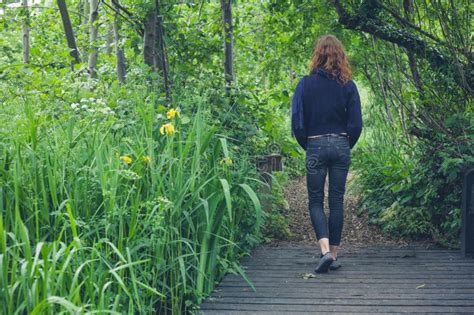 Woman Walking On Path In Forest Stock Image Image Of Tree Fashion