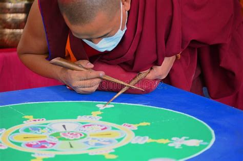 Buddhist Monk Drawing Ritual Mandala With Multicolored Sands Editorial