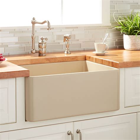 This is a beautiful way to incorporate some darker colors into a brighter. 20" Reinhard Fireclay Farmhouse Sink - Beige - Kitchen