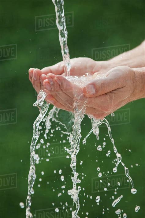 Hand Pouring Water
