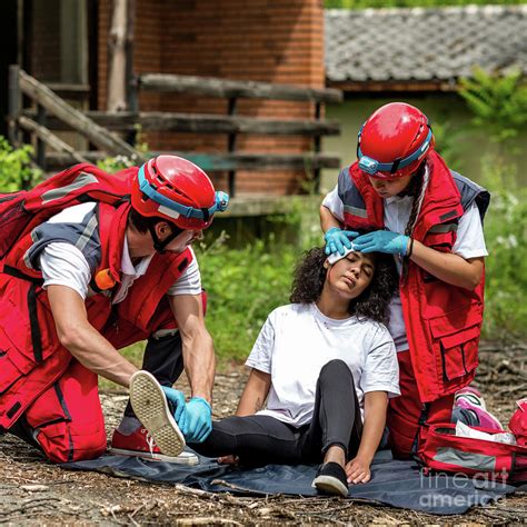 Rescue Team Helping Injured Woman Photograph By Microgen Images Science Photo Library Fine Art
