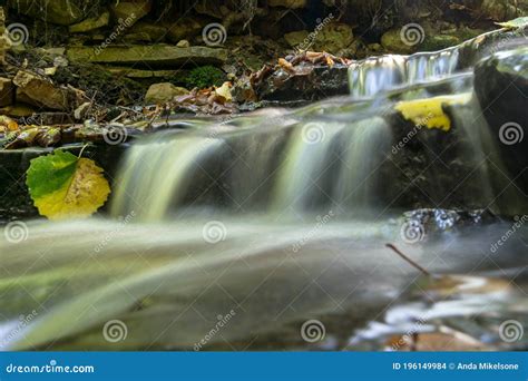 A Small Rapid River Flows Through Dolomite Rocks Long Term Exposure