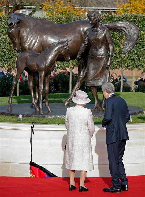 Queen Elizabeth Ii Unveils A Statue Depicting Herself Alongside A
