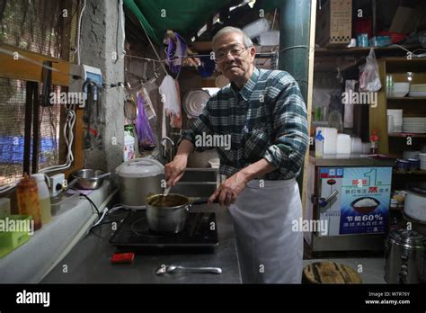 70 year old japanese man koji shimada makes curry food at his japanese style curry restaurant in
