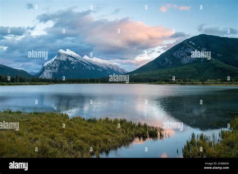 Evening Skies Over Mt Rundle Reflected In Vermilion Lakes Banff