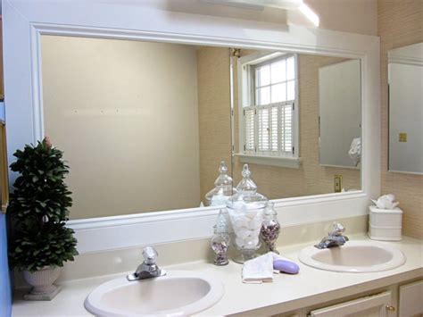 The bathroom mirror frame can be painted or stained in color you any color that matches the bathroom. How to Frame a Bathroom Mirror