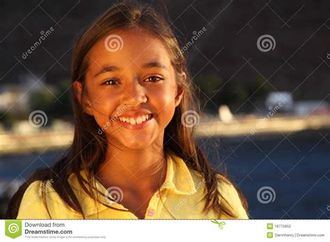 Young Girls Cute Windswept Smile In Evening Light Stock
