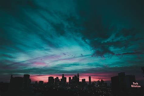 1170x2532px Free Download Hd Wallpaper Teal Sky Under City