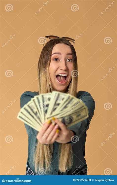 woman holds cash money in dollar banknotes stock image image of rich background 227221483
