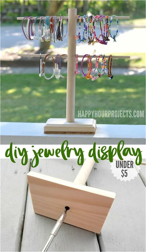 This boho chic diy project combines style with function by creating a cool way to hang a mirror on the wall! DIY Jewelry Display Stand - Happy Hour Projects