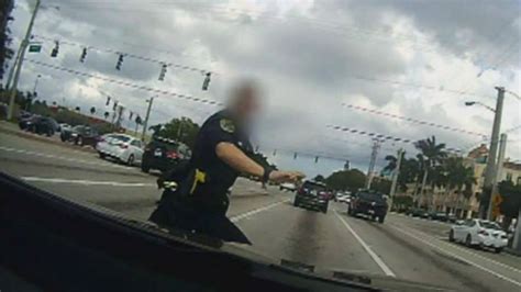 Florida Police Officer Struck By Suv In Dashcam Video While Chasing Shoplifter Fox News