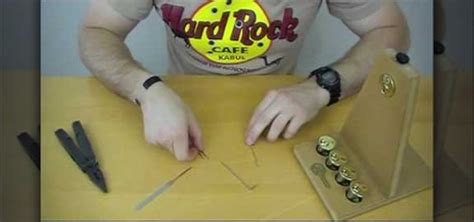 Picking a lock with a paper clip. Make Your Own Lock Picking Set Using Paperclips