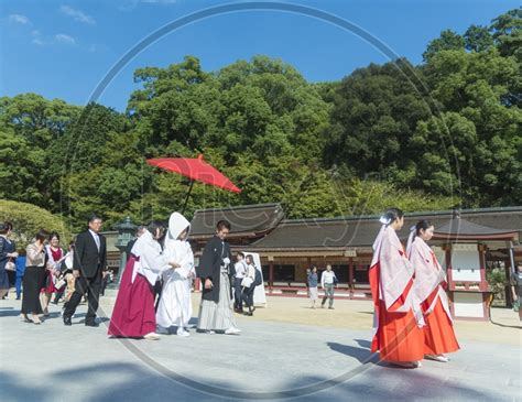 Image Of Bride Entrance During A Japanese Wedding Conducted In A Shrine Complex In Fukuoka