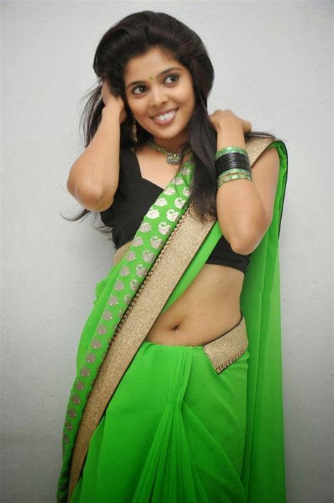 Shravya Sexy Navel And Cleavage Show In Green Saree Photoshoot Stills