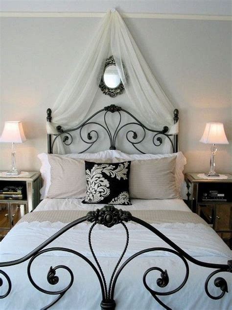 Can you hear a harpsichord providing some romantic background this wrought iron canopy bed is shown with an exquisite wrought iron chandelier. 25+ Cool Black Wrought Iron Bed Frame Designs Bedroom # ...