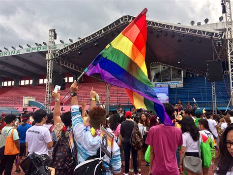 The flag with black stripes on both ends, with grey as the second stripe and second to last stripe, white in between them both and green in the middle. LGBT flags fly loud, proud, united for equality, against ...