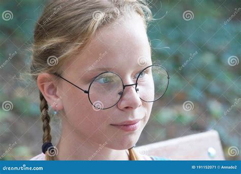 Portrait Of A Smiling Girl In Round Glasses Stock Image Image Of Adult Pretty 191152071