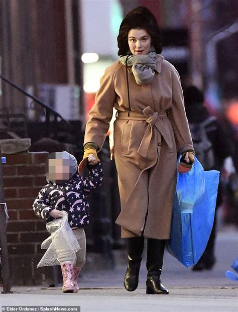Rachel Weisz Wraps Up In A Camel Coat And Oversized Hat Readsector