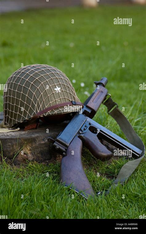 World War II US Army Helmet And Thompson Sub Machine Gun Stock Photo Alamy