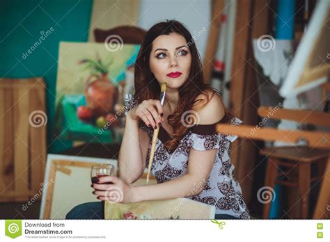 Woman Artist Painting A Picture In A Studio Stock Photo Image Of