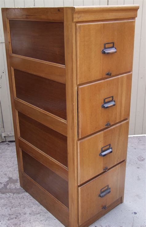 And do all of that with the efficiency required of them. Very Solid Four Drawer Golden Oak Filing Cabinet | 710521 ...
