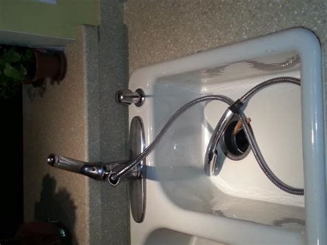 Check spelling or type a new query. Replace Delta faucet sprayer hose - hole in sink to tight ...