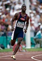 American track athlete Michael Johnson competes in the heats before ...
