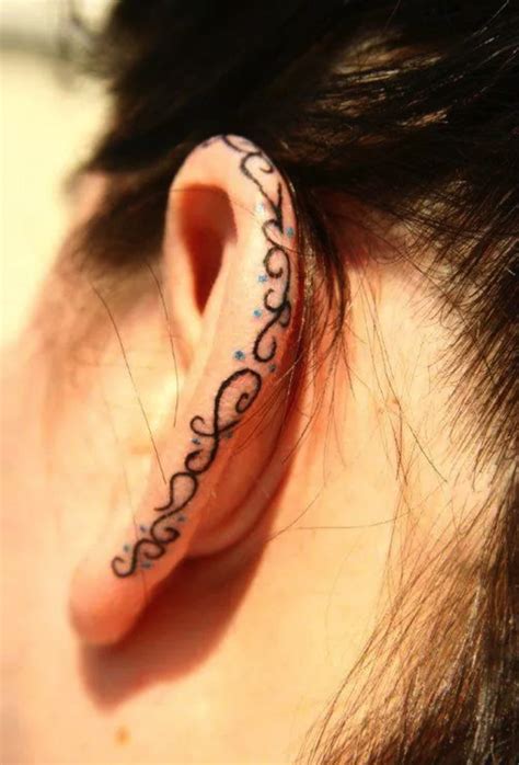 16 Creative Ear Tattoos That Would Make Mike Tyson Hungry