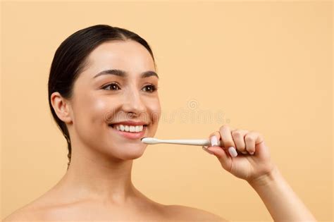 Oral Care Closeup Portrait Of Young Indian Woman With Toothbrush In