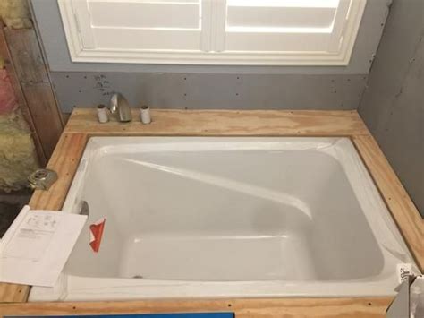 Kallista's perfect deep soak bathtub has two raised corner seats at different. KOHLER Greek 48 in. x 32 in. Acrylic Drop-In or Undermount ...