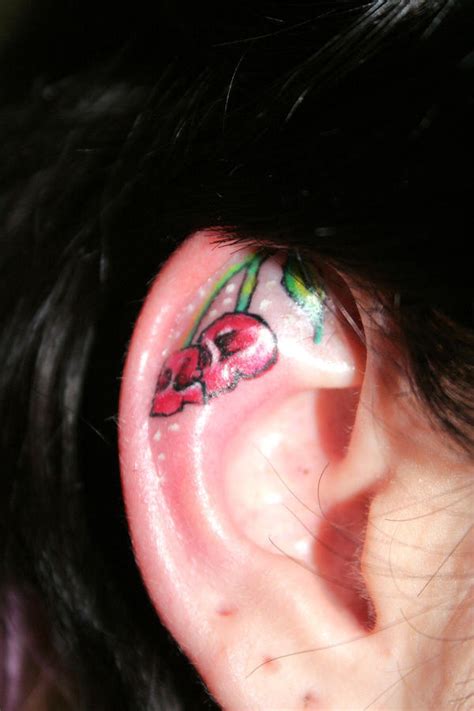 Cherry Ear Skull Tattoo By 2face Tattoo On Deviantart